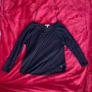Juicy Couture black shirt in good condition. Upper back is see through